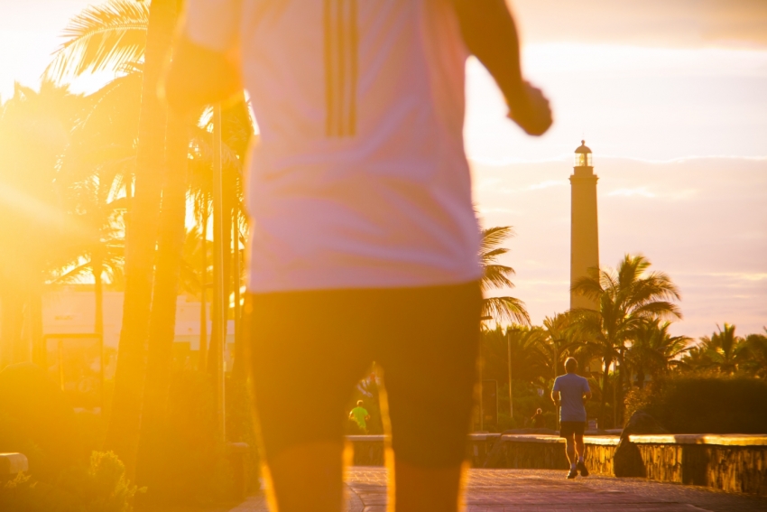 Jogging along the beachfront at Meloneras in Maspalomas