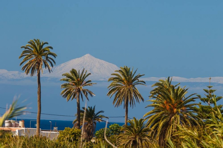 Teide volcano covered in snow as seen from Gran Canaria